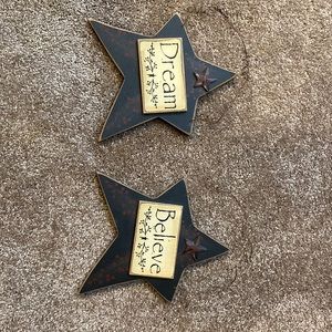 Two small primitive signs.